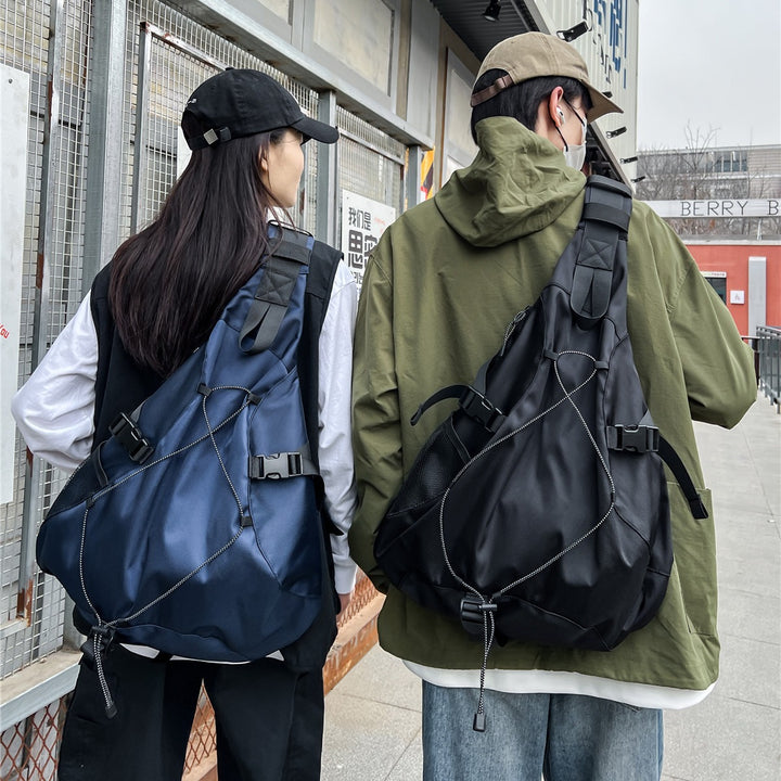 Sporty sling backpack with adjustable straps and practical organizer Kalsten