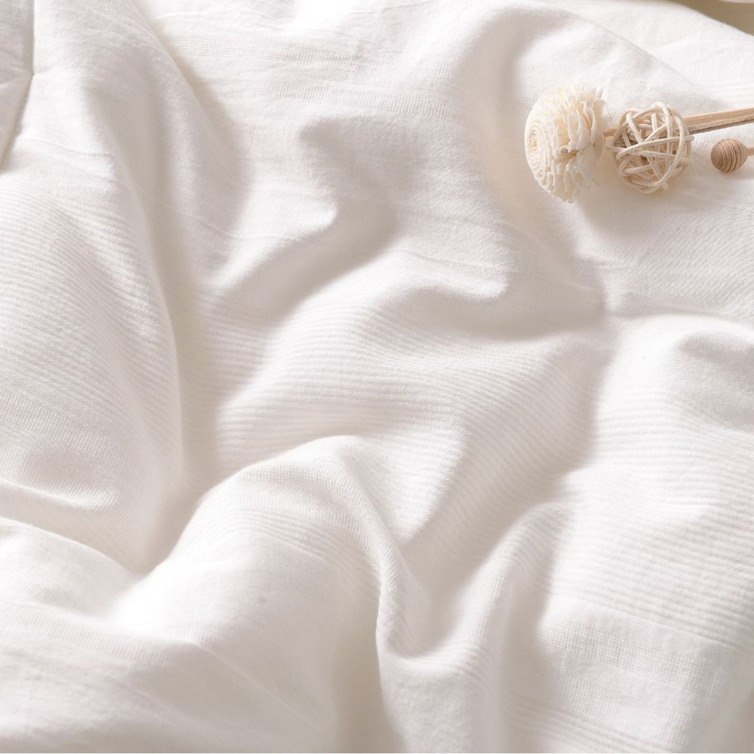 All-season cotton blanket with breathable and hypoallergenic filling