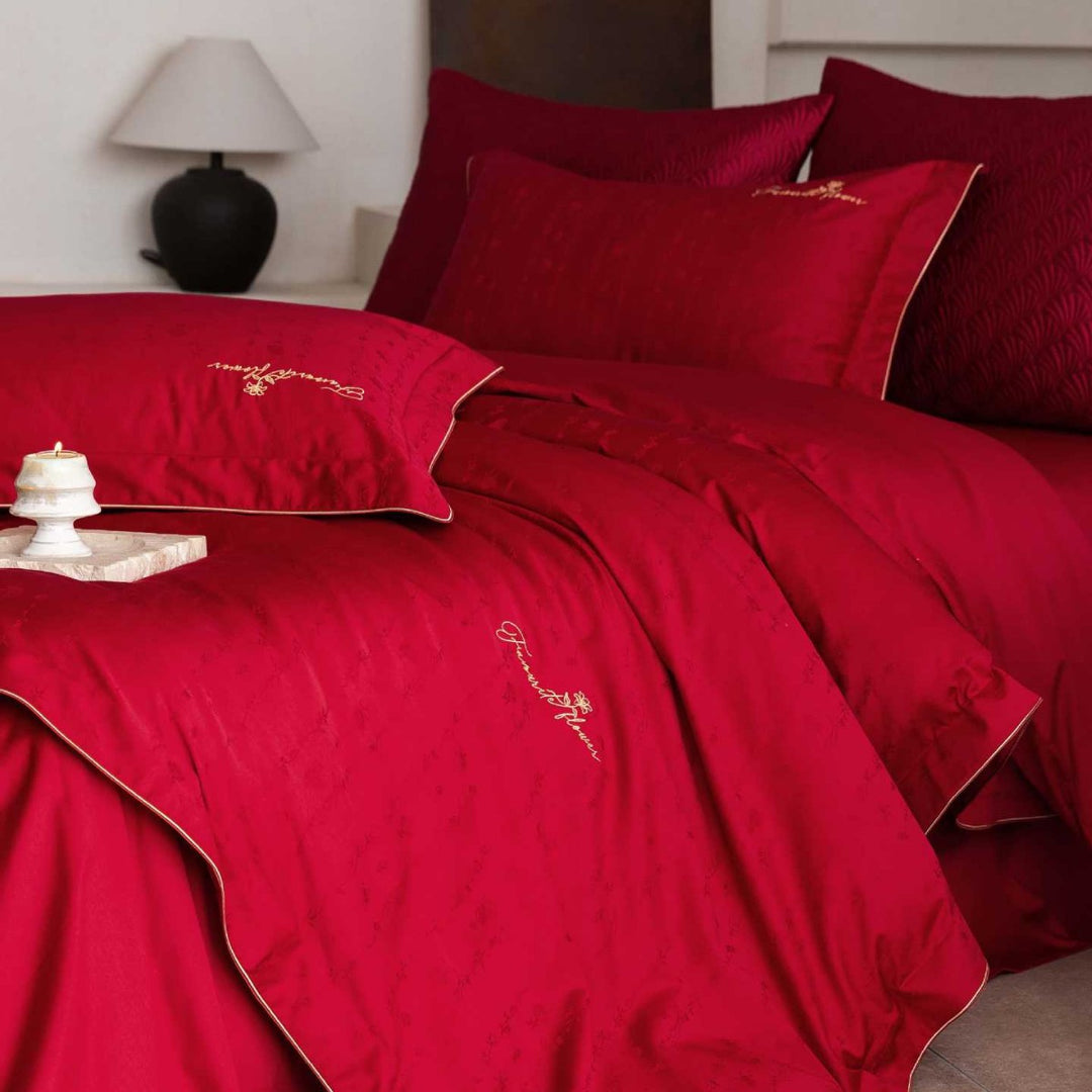 Luxurious satin bedding complete set with quilted cover and delicate logo embroidery