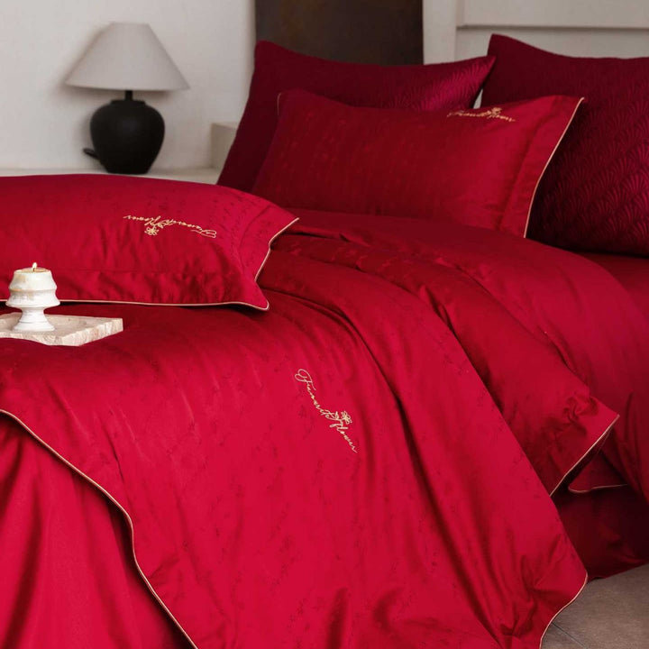 Luxurious satin bedding complete set with quilted cover and delicate logo embroidery