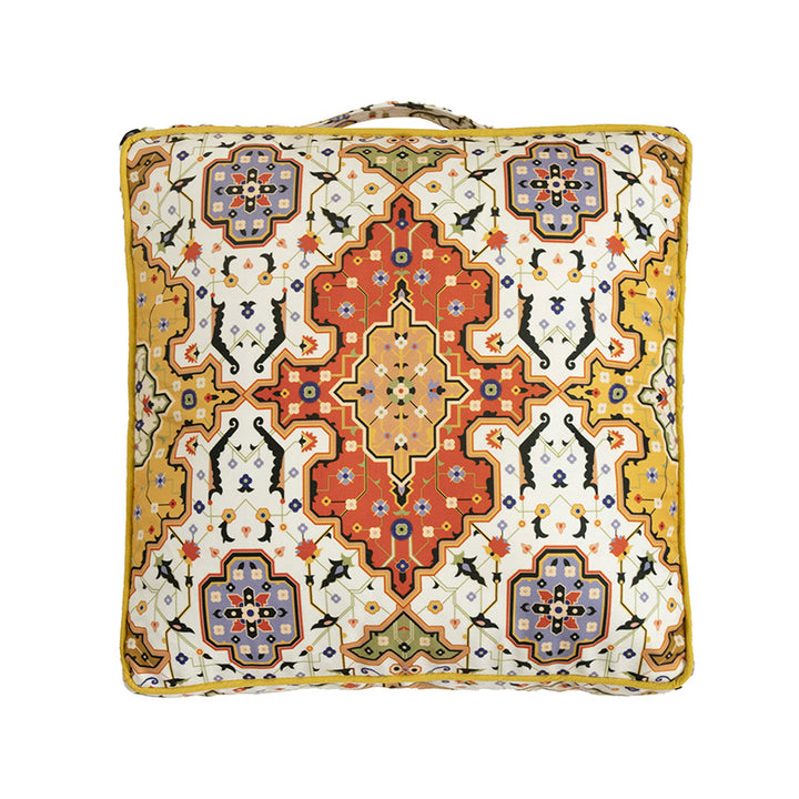 Square decorative cushion with oriental medallion print, piping and carrying handle