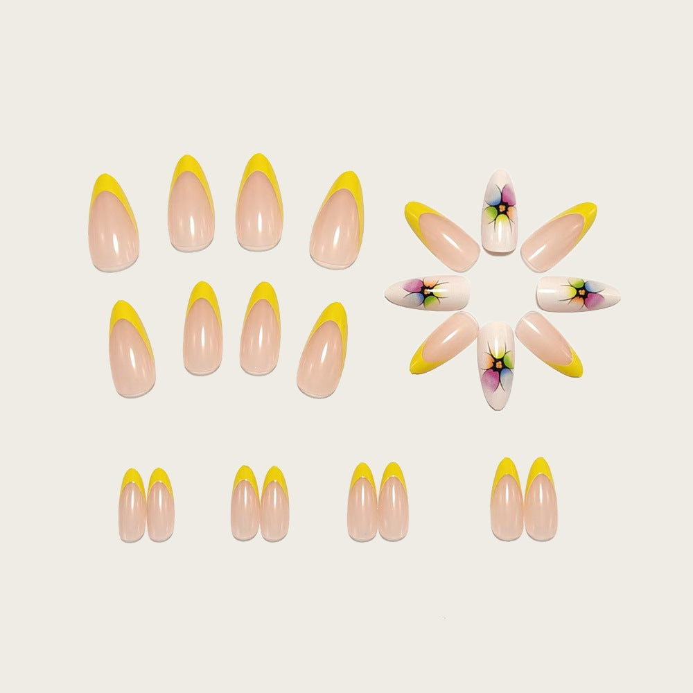 Artificial nails with colorful floral designs and striking color accents Kalsten