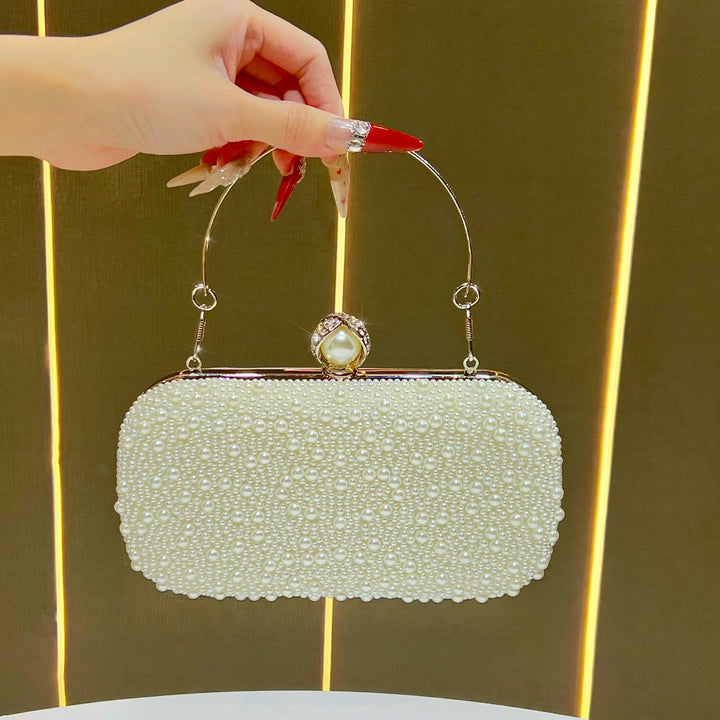 Decorative Pearl Clutch with Gold Accents