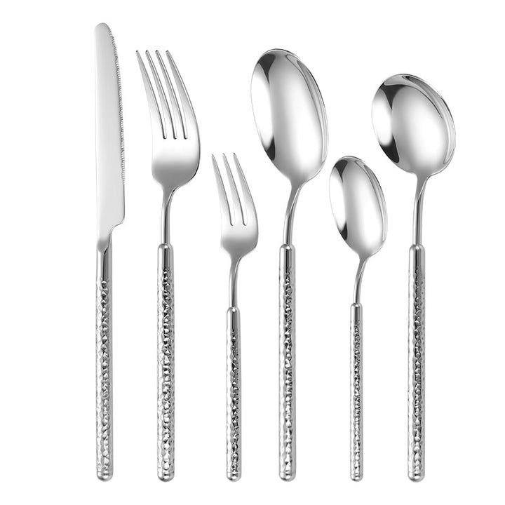 Elegant dessert spoon with elaborate handle design Kalsten