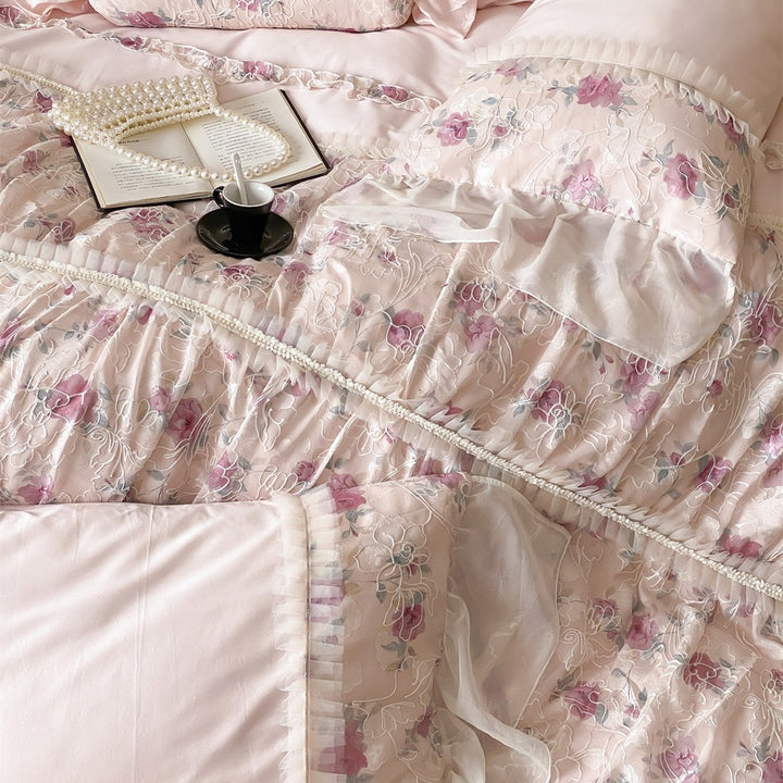 Romantic quilted bedding set with ruffles and floral pattern