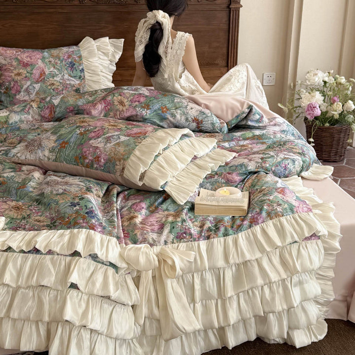 Luxurious bedding set with ruffles, bed skirt, and floral print