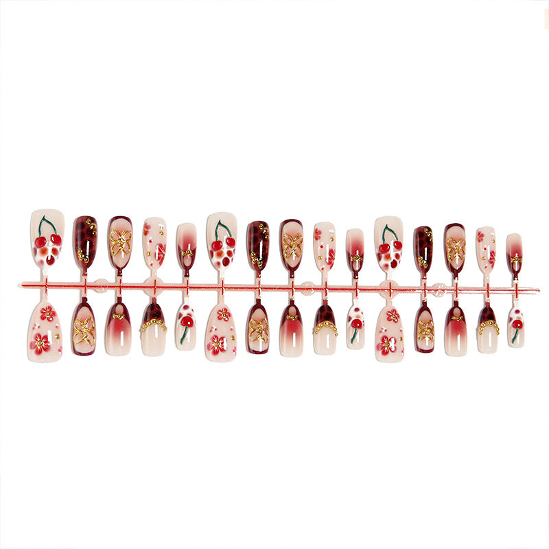 Artful nail tips with cheerful flower and cherry design Kalsten