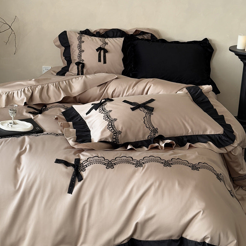Luxurious satin bedding set with ruffles, lace embroidery and decorative bows