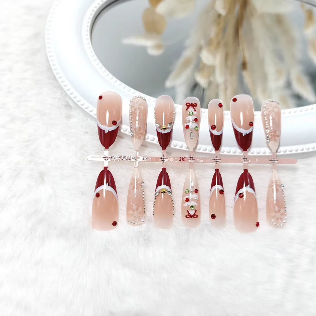Artificial nails with festive designs and glitter accents Kalsten