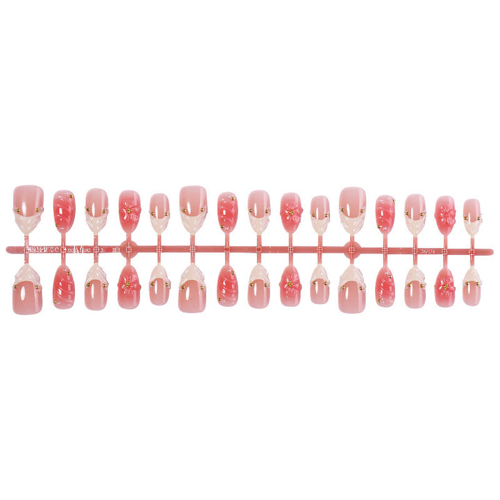 Artificial high-gloss nails with floral accents Kalsten