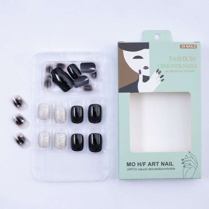Artificial nails in elegant black with gloss and creative accents Kalsten