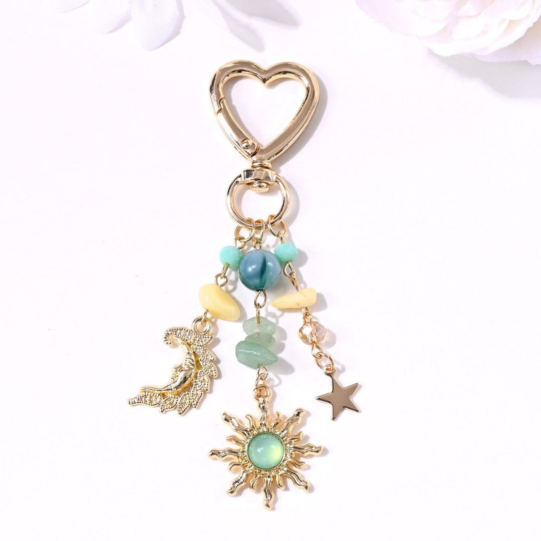 Keychain with Sparkling Sun Motif Kalsten