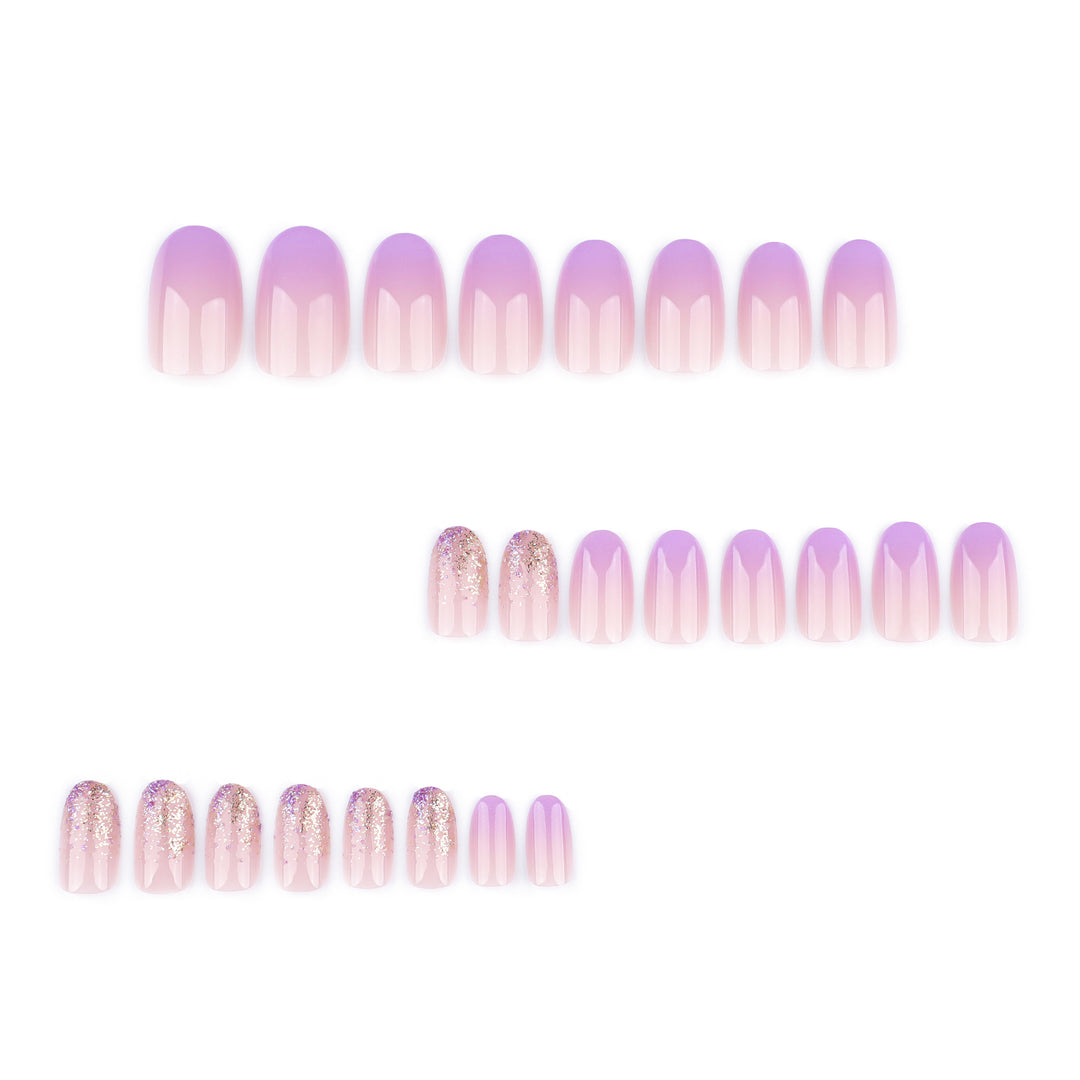 Artful nail art with ombre design and glitter accents Kalsten