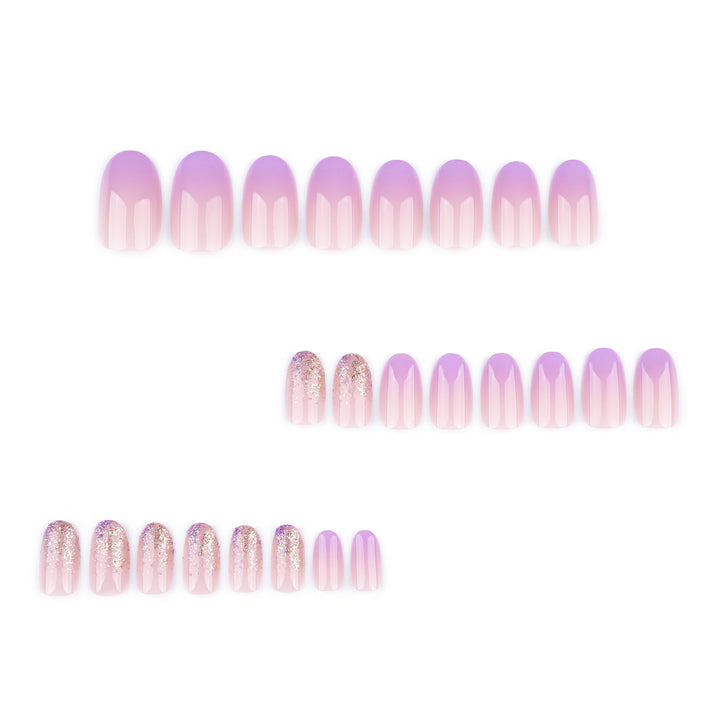 Artful nail art with ombre design and glitter accents Kalsten