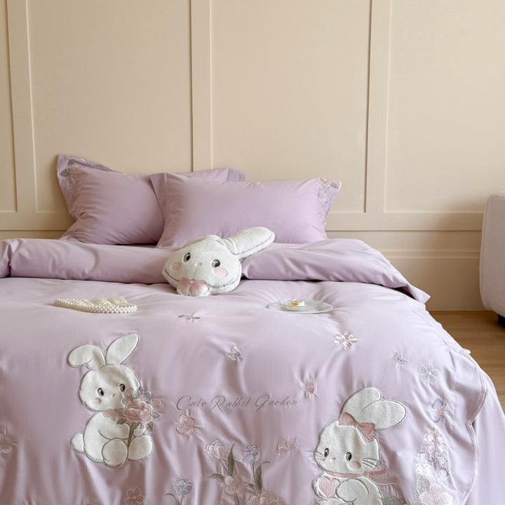 Children's bedding set with embroidered bunny appliqués, plush pillow and extra soft cotton satin