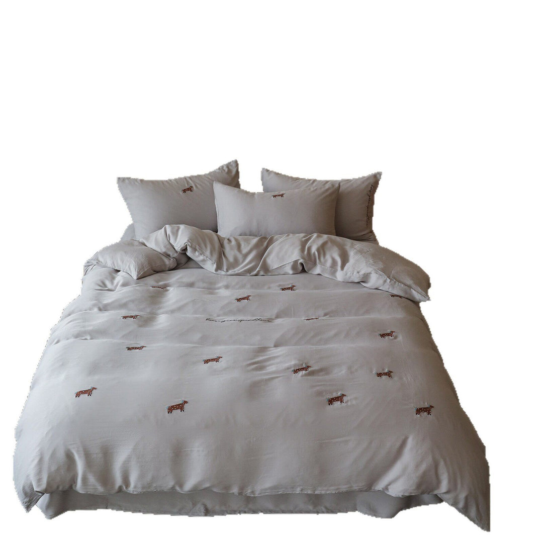 Finely woven bedding set with embroidered dachshund motifs