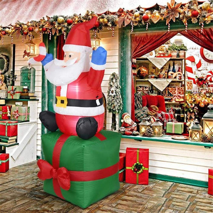 Inflatable Santa Claus decoration figure on gift package