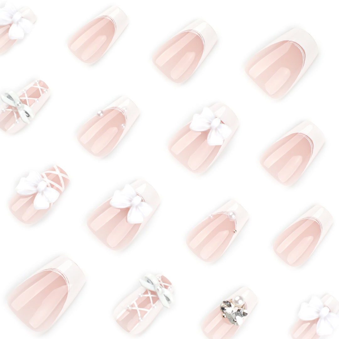 Artful Nail Art with Bows and Rhinestone Decorations Kalsten