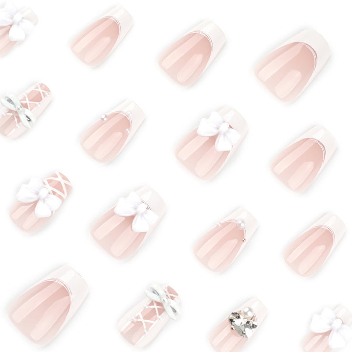 Artful Nail Art with Bows and Rhinestone Decorations Kalsten
