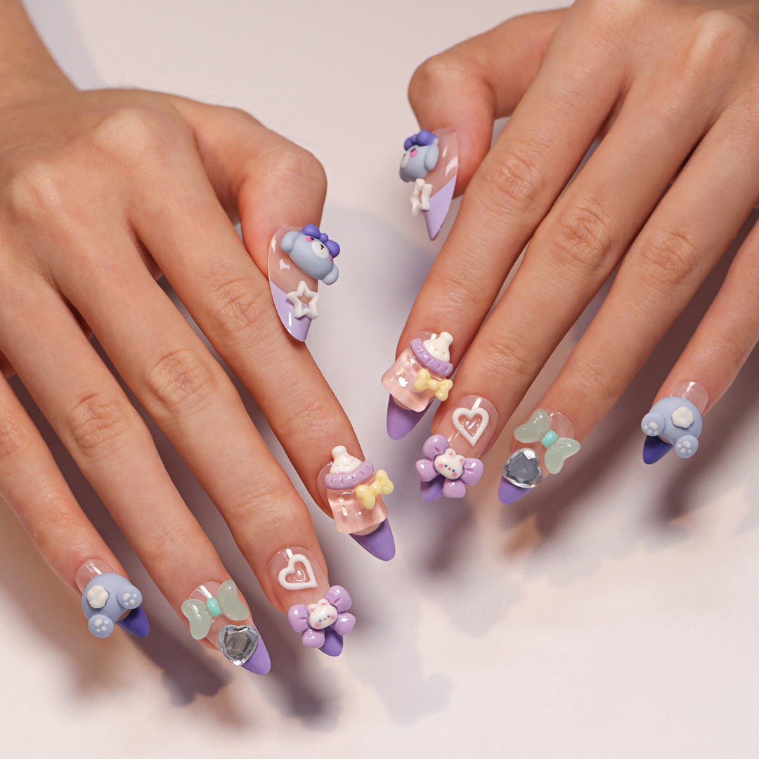 Artificial nail art with playful designs Kalsten
