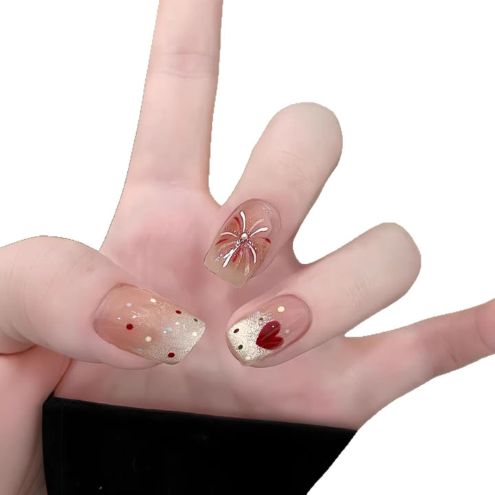 Artistic Press-On Nail Art Set with Floral and Glitter Accents