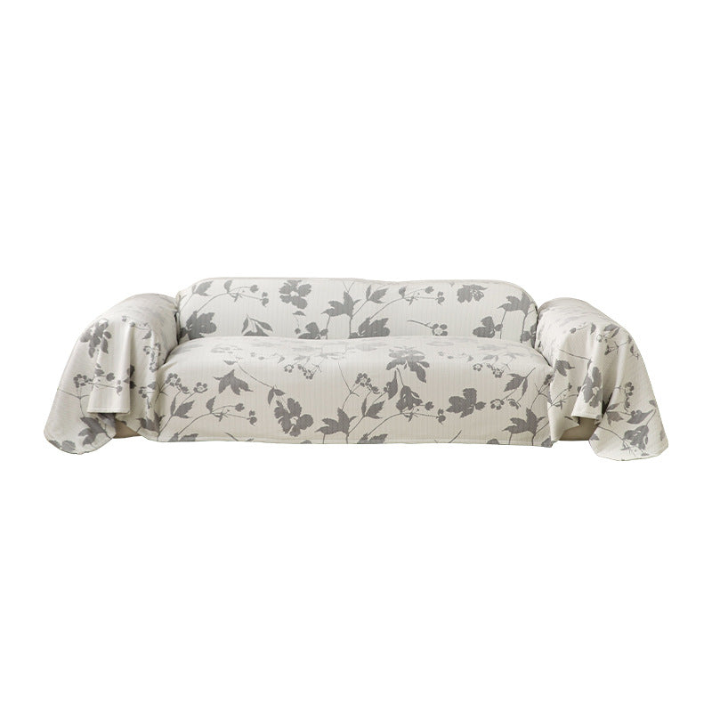 Elastic sofa cover with floral relief structure and universal fit