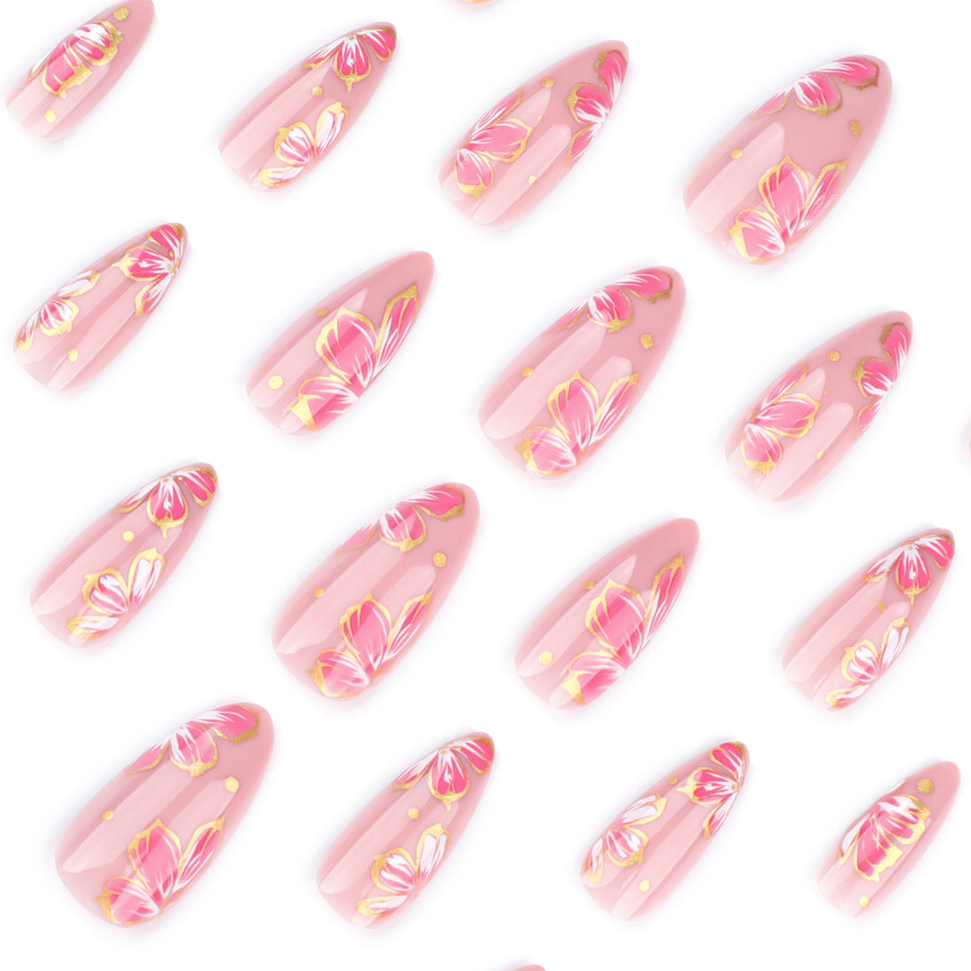 Artful nail art with elegant floral designs and gold accents Kalsten