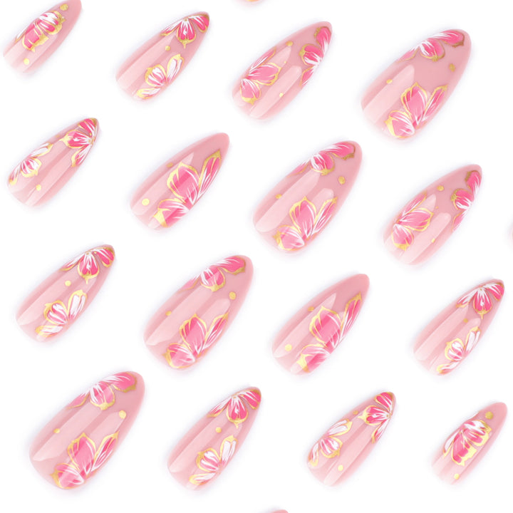 Artful nail art with elegant floral designs and gold accents Kalsten