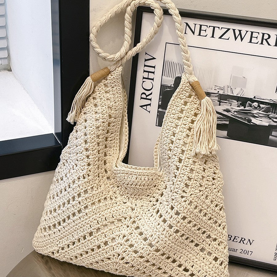 Hand-knotted shoulder bag with tassels and spacious interior Kalsten