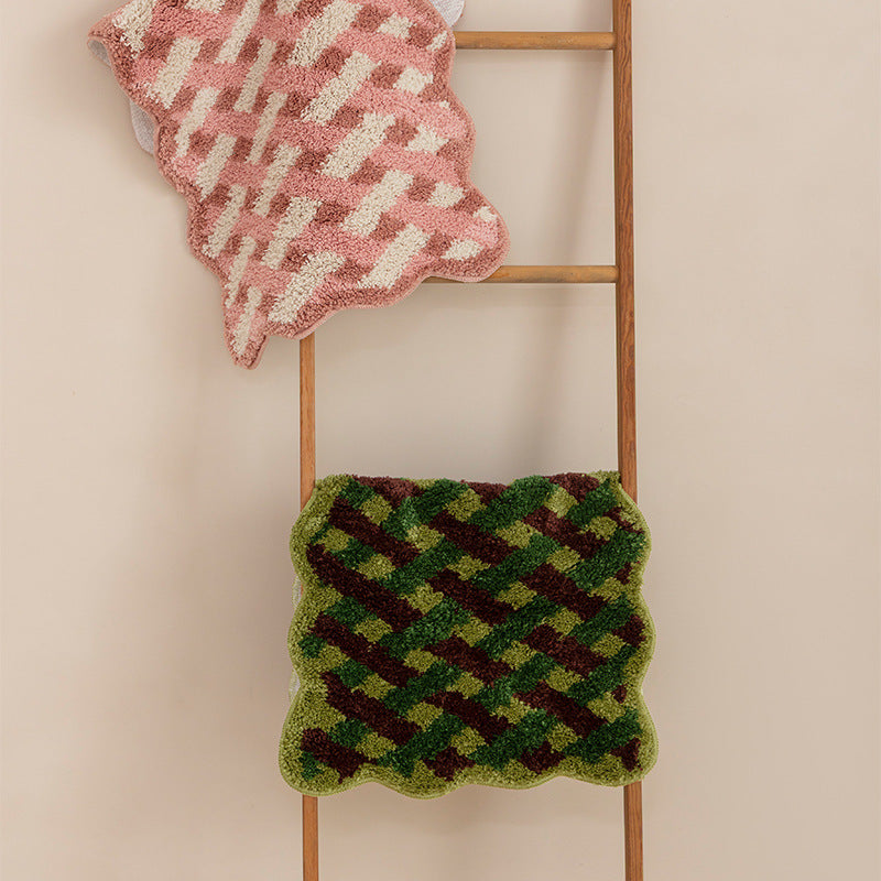 Tufted bathroom runner with wavy hem and relief-style braided pattern Kalsten