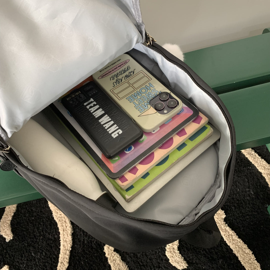 Practical backpack with colorful applications Kalsten