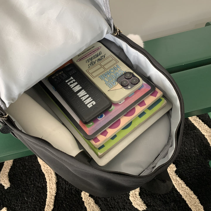 Practical backpack with colorful applications Kalsten