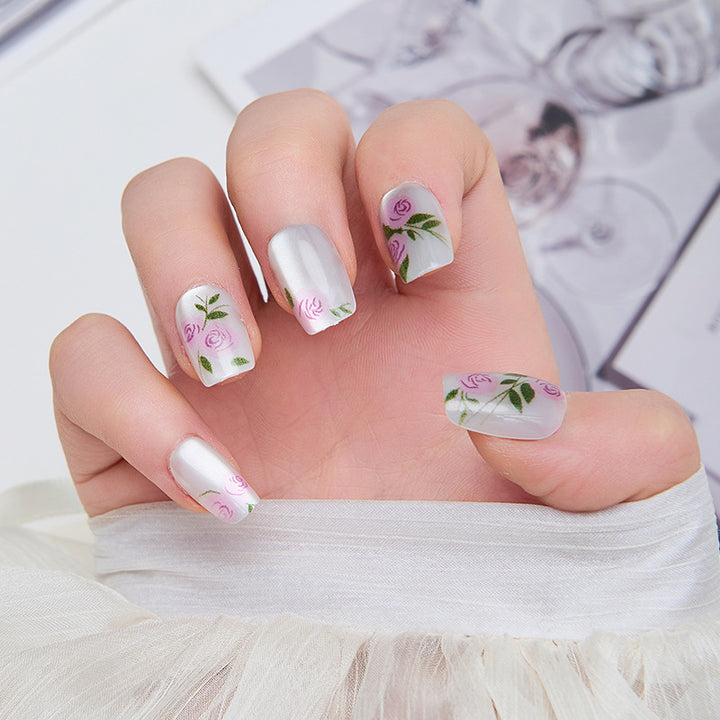 Artistic nail extensions with floral accents Kalsten