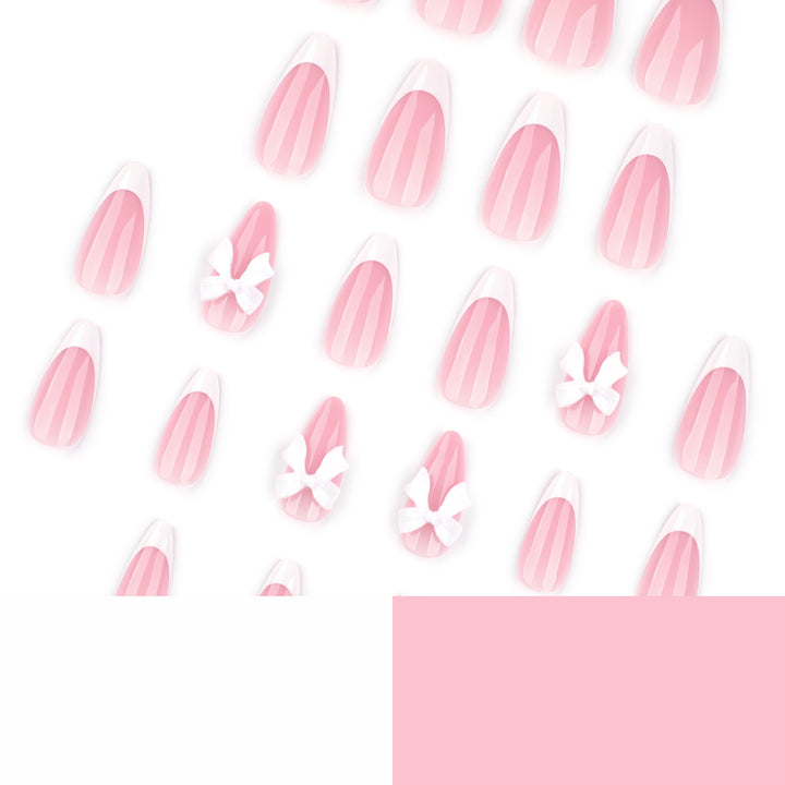 Artful nail designs with elegant tips and delicate bow motifs Kalsten