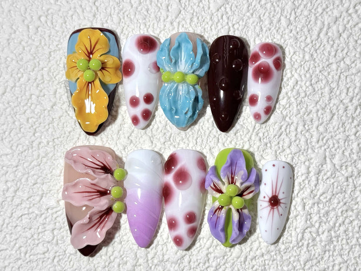Artistic Press-On Nail Set with Floral and Green Accents