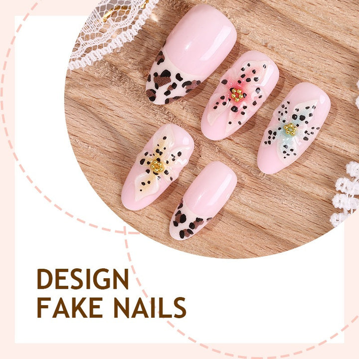 Artificial nail set with exquisite floral design and creative glitter accents Kalsten