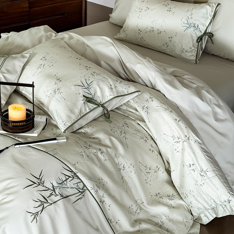 Reversible cotton satin bedding set with fine bamboo print and pillowcases with tie bands