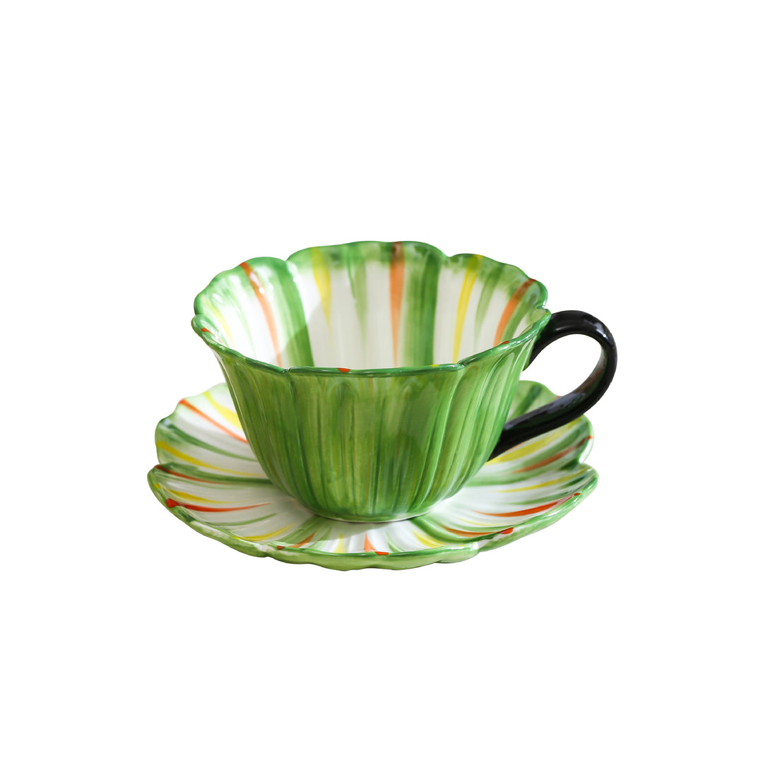 Handcrafted ceramic mug with shell-shaped wave edge and contrasting handle