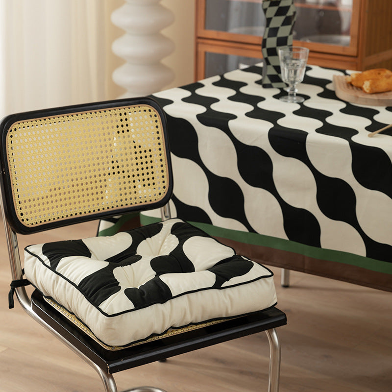 Padded chair cushion with ties and tufted seat Kalsten