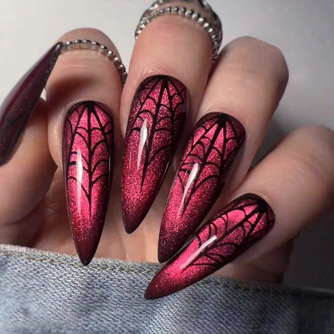 Creative Stiletto Nail Art with Blood Red Accents Kalsten
