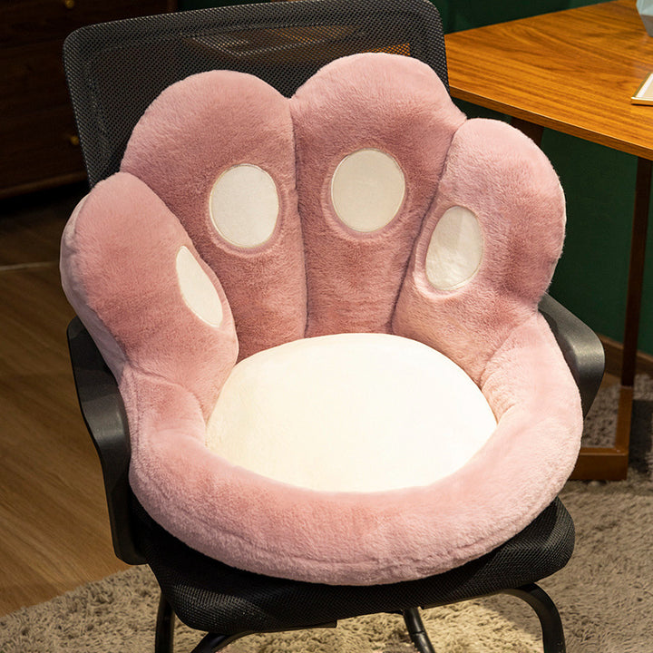 Plush pet bed with raised edge and removable cuddly pillow