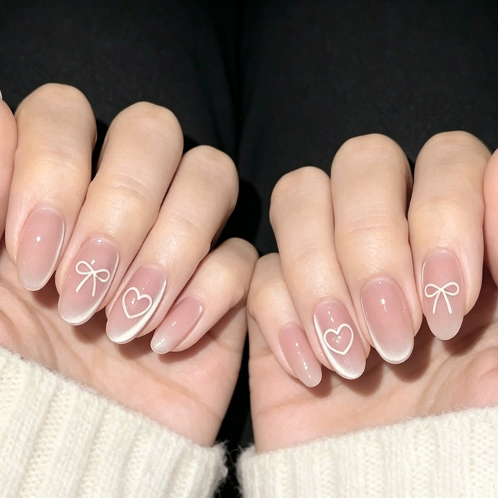 Elegant Heart and Bow Nail Art Kalsten