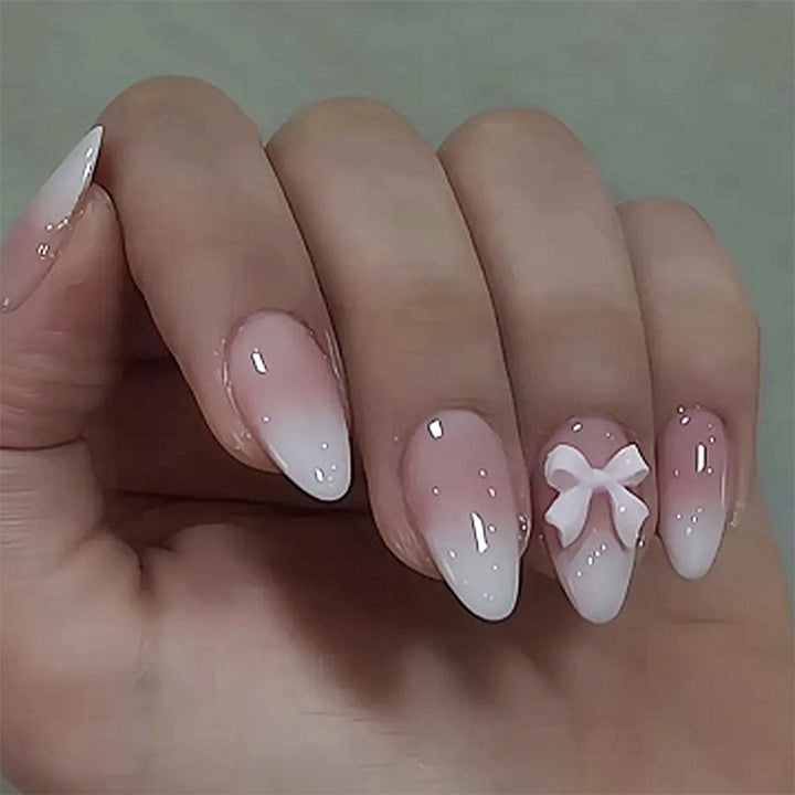 Acrylic nail set with cute bow design Kalsten