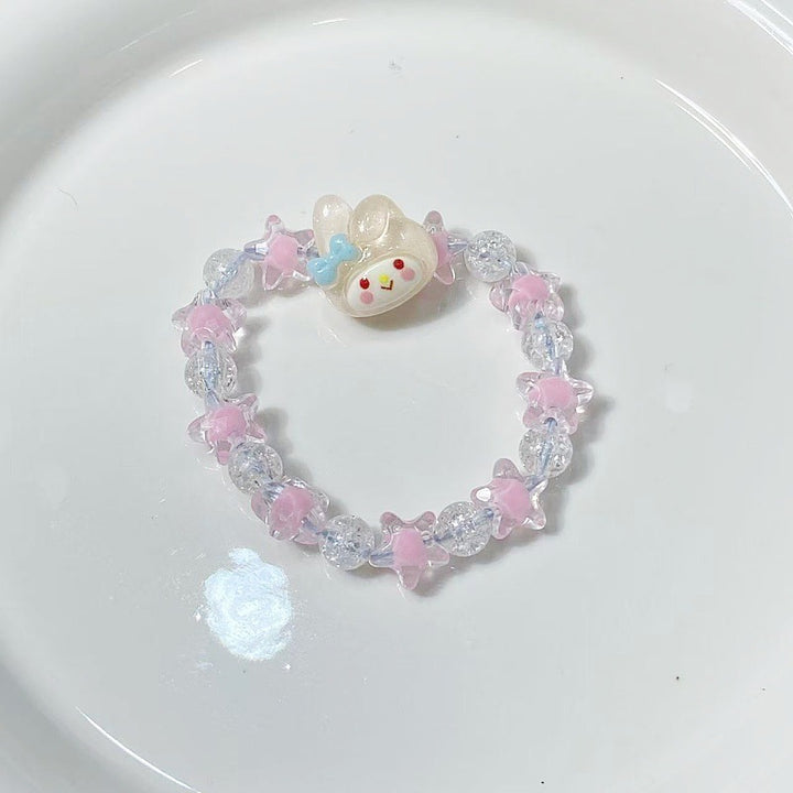 Playful bracelet with stars and cute pendant Kalsten