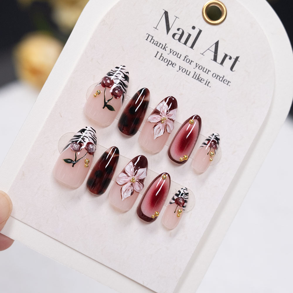 Artistic Stiletto Press-On Nails with Floral and Abstract Designs