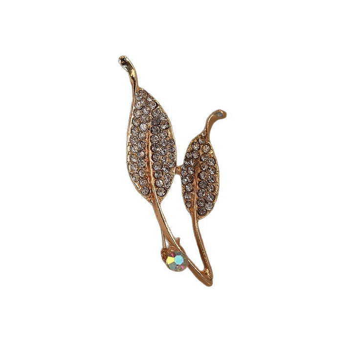 Elegant brooch with leaf shape and crystals Kalsten