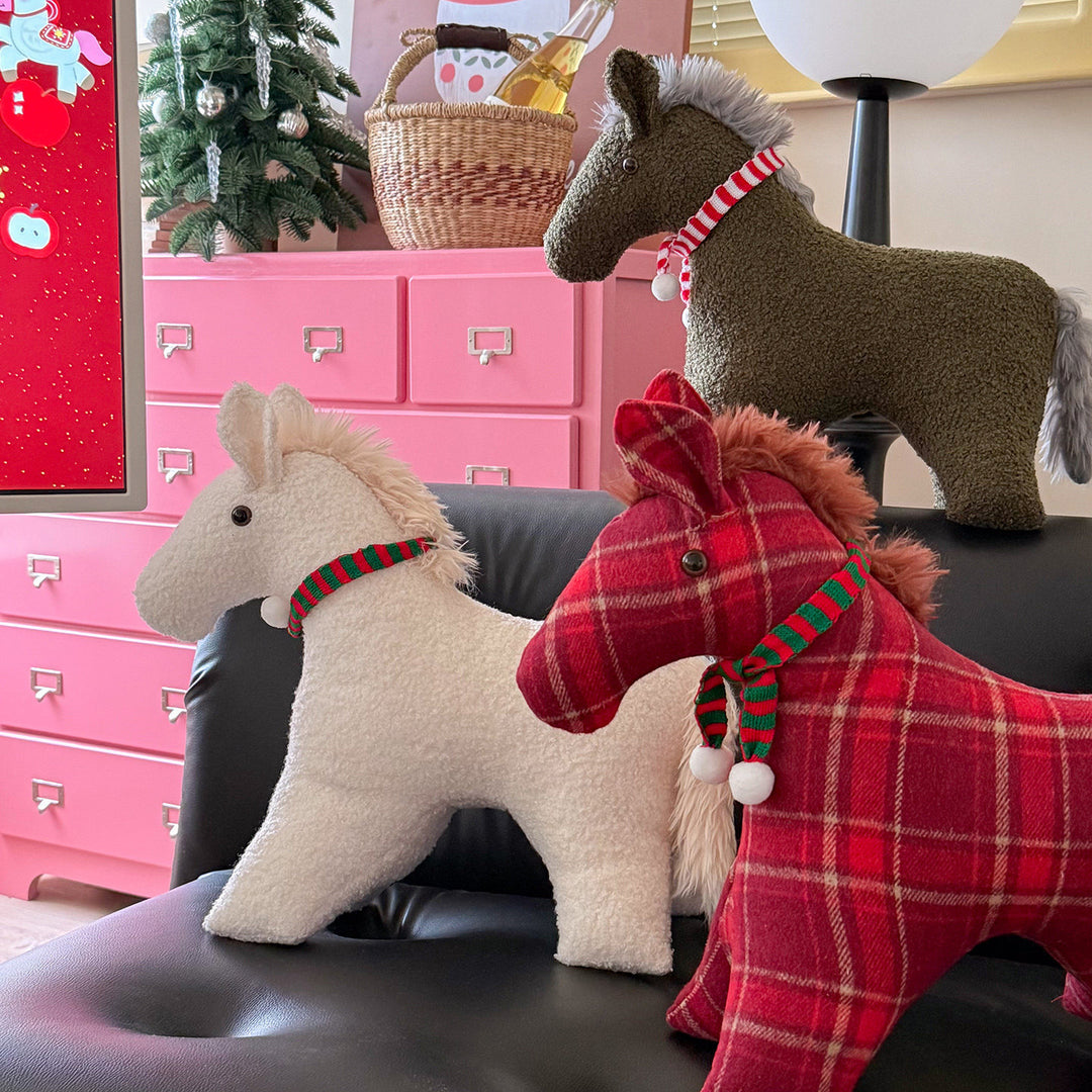 Decorative cuddle horse made of teddy fleece as a decorative and play cushion