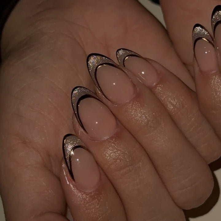 Artificial nail art with playful dots and bows Kalsten