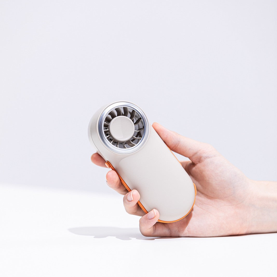 Unisex nan compact rechargeable handheld fan with ergonomic grip and carrying strap Kalsten
