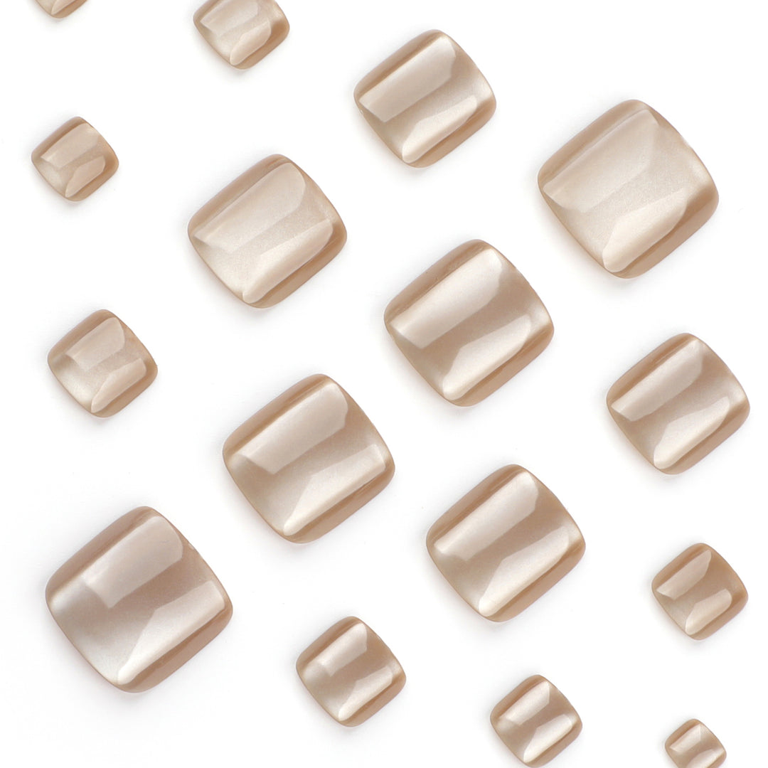Artful nail art with glitter accents and soft ombre effect Kalsten